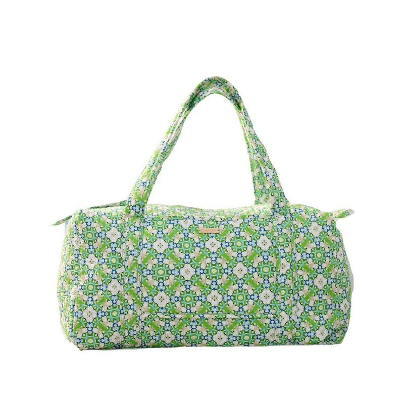 Green patterned handbag on a white background