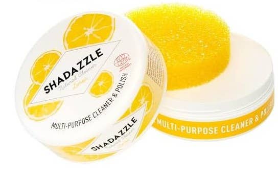 Shadazzle multi-purpose cleaner and polish with a yellow sponge on a white background