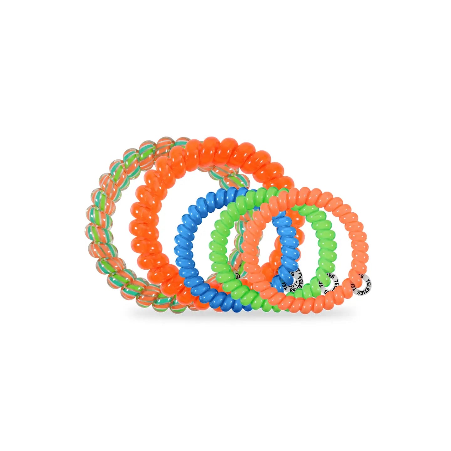 Set of colorful coiled bracelets on a white background