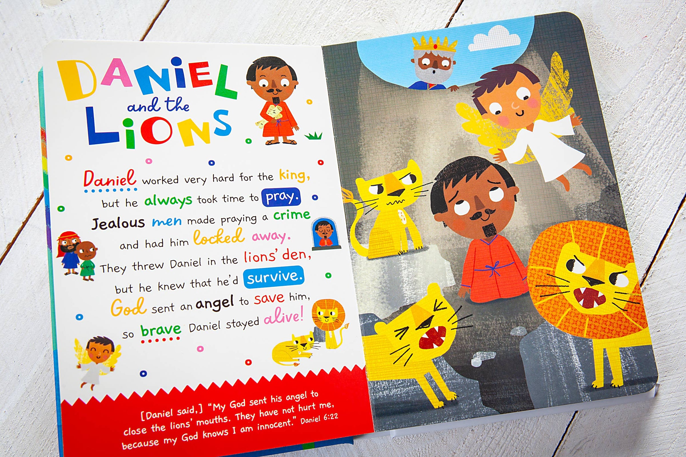 Children's book titled 'Daniel and the Lions' with colorful illustrations on a white background