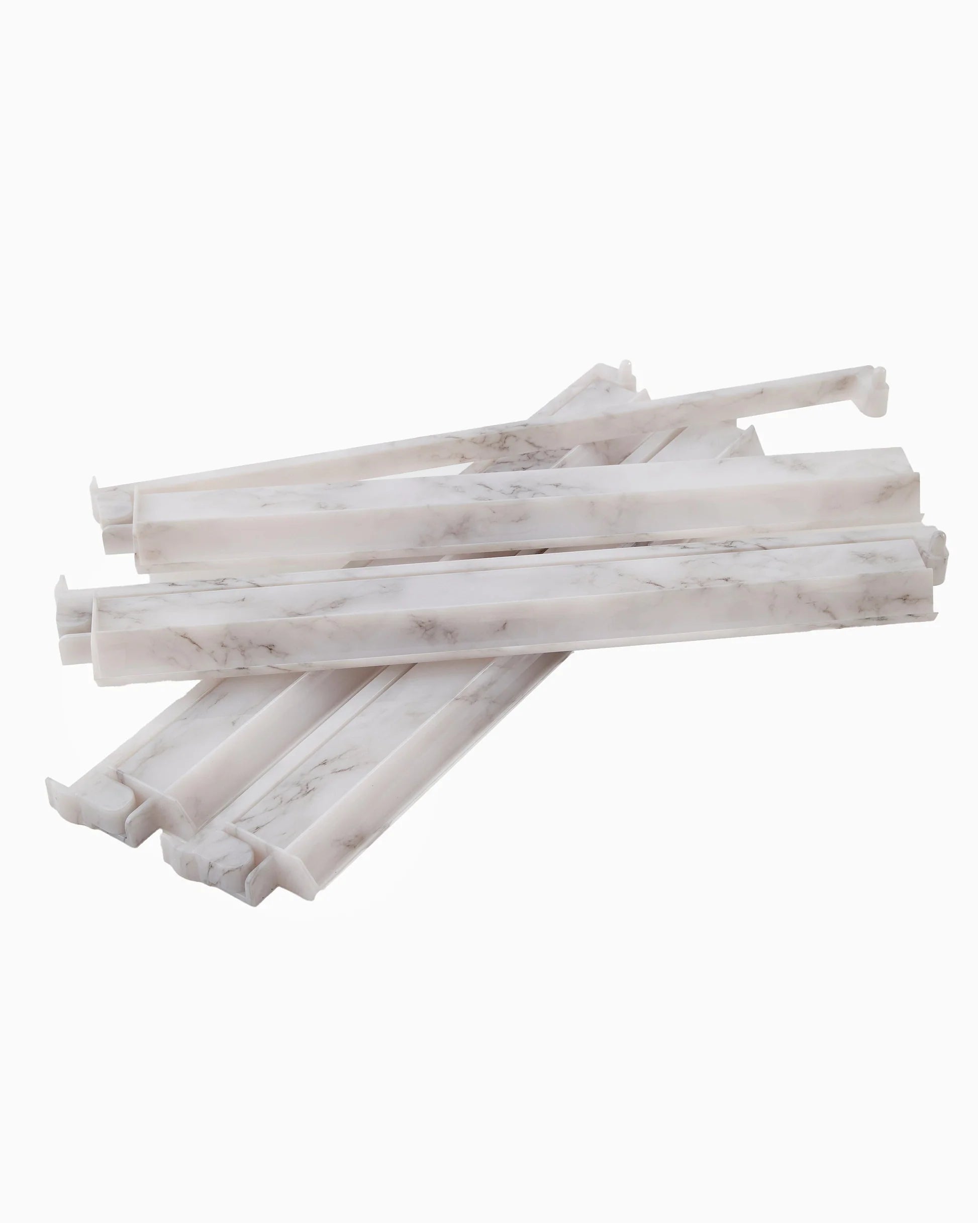 Stack of white mahjong pushers on a white background