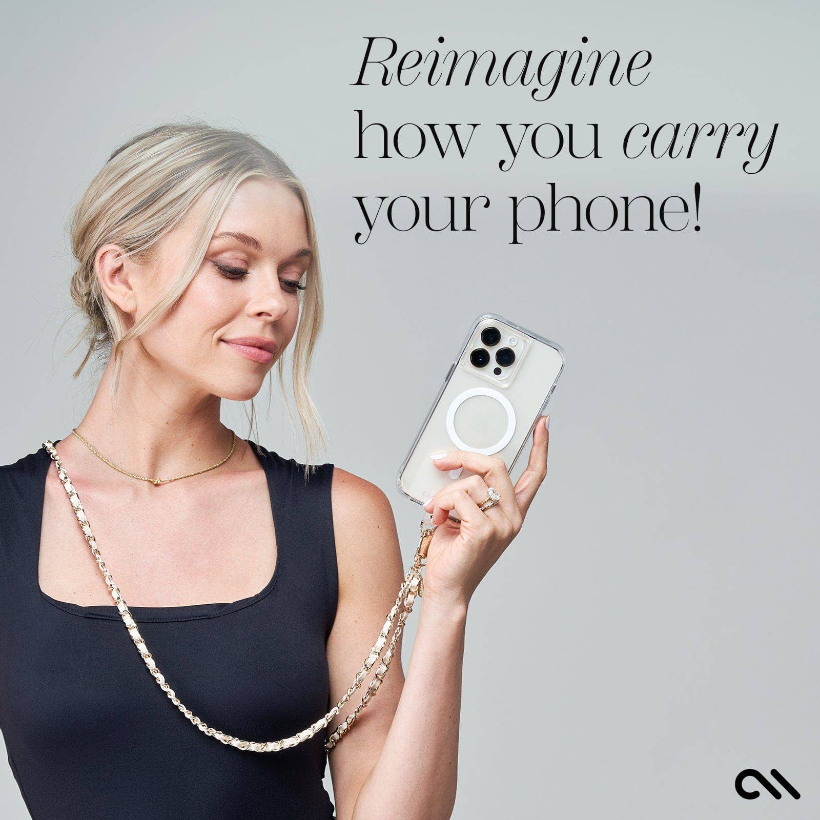 Woman holding a phone with a chain case against a gray background, text 'Reimagine how you carry your phone!'.