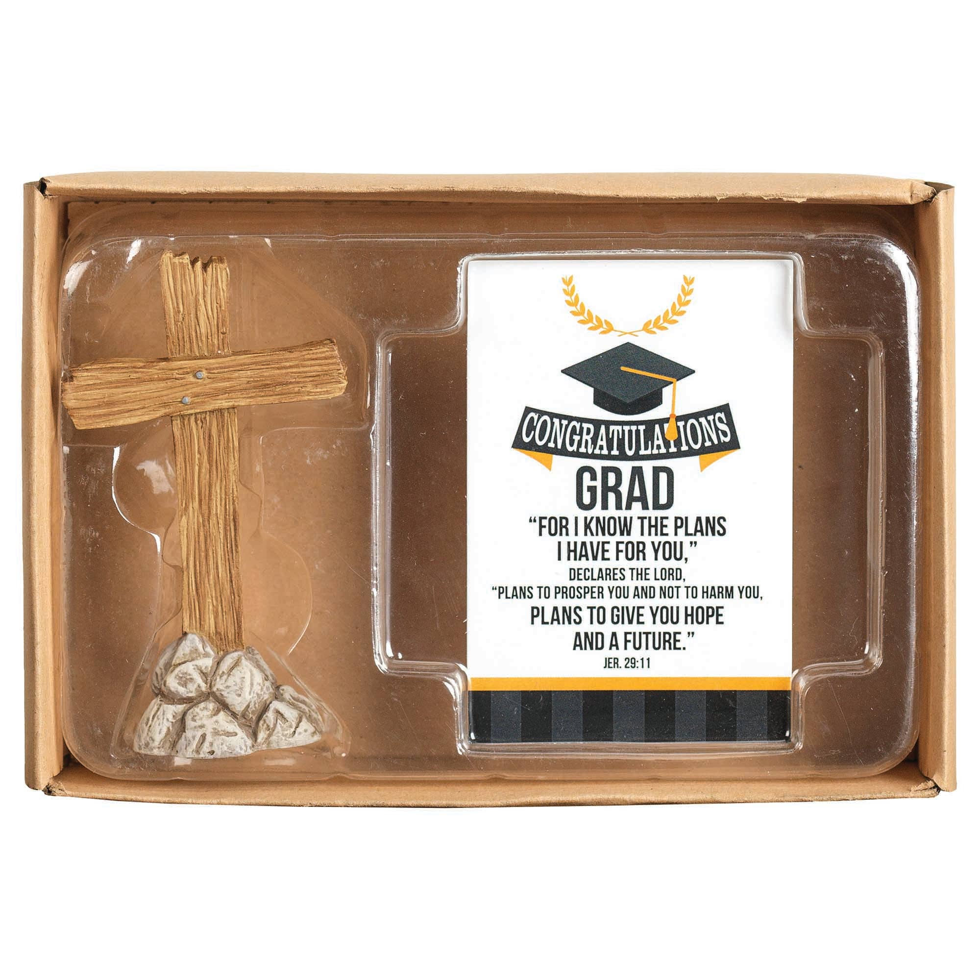 Graduation-themed gift set with cross, card, and stones in a box