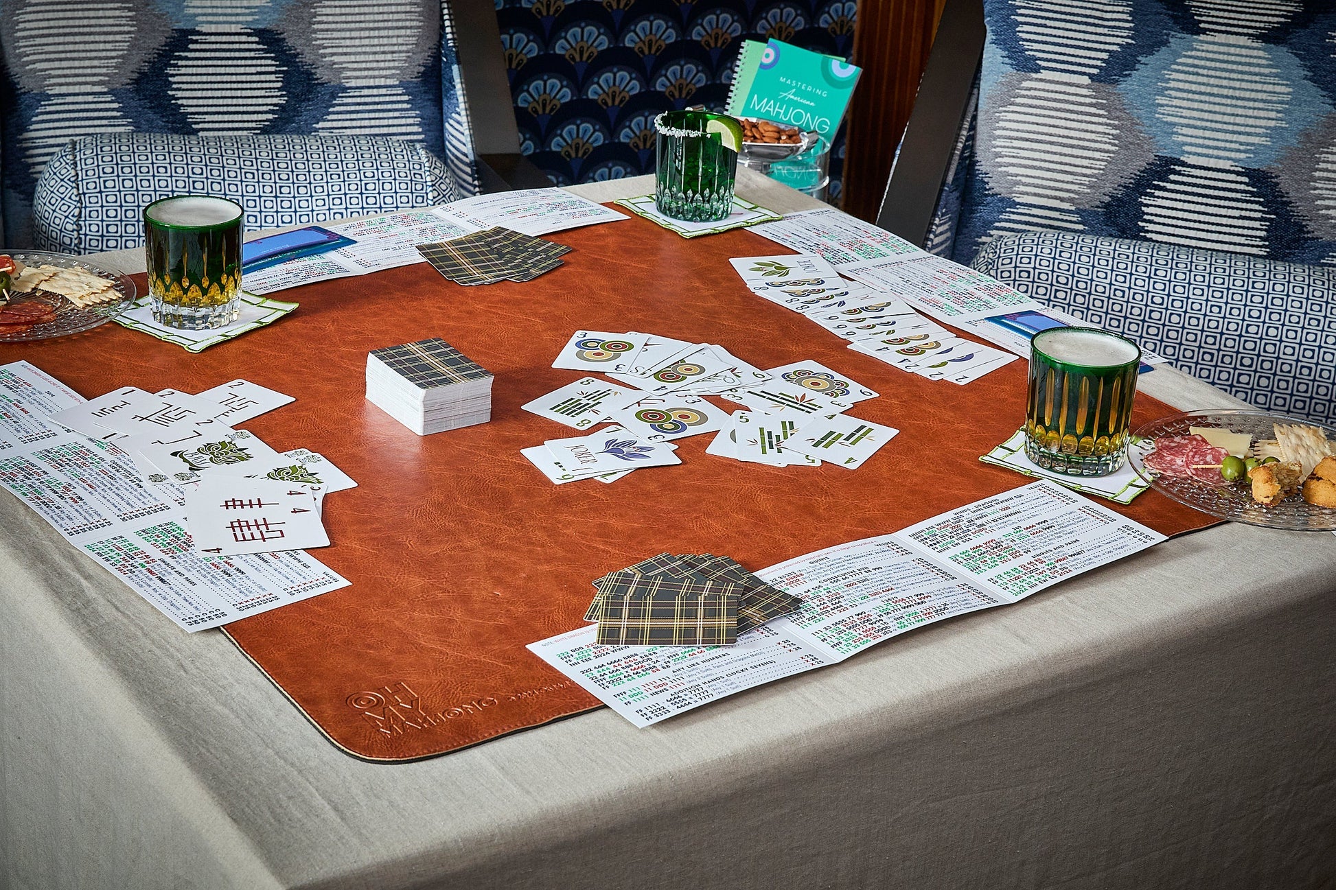 Brown Leather Mahjong mat with game pieces on table 