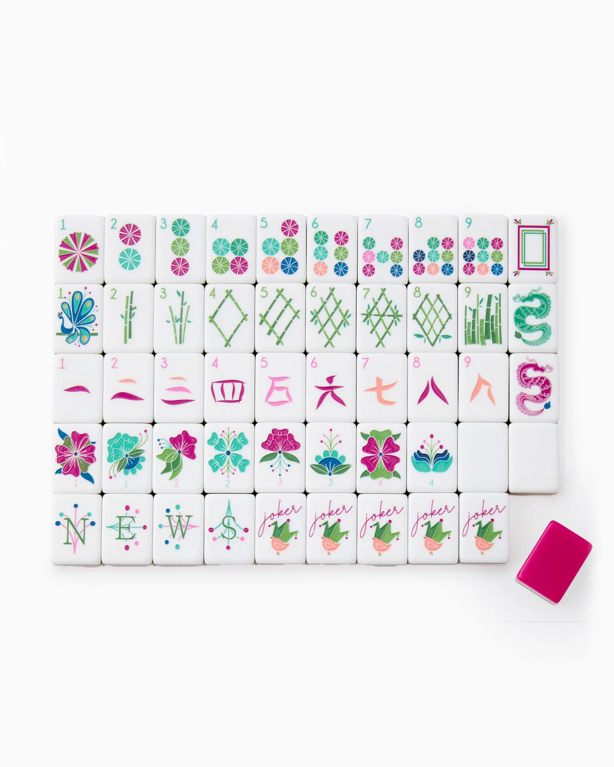 Set of colorful mahjong tiles with various designs on a white background