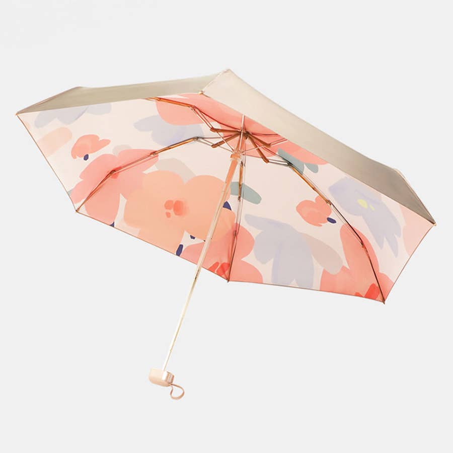 Floral patterned umbrella on a white background