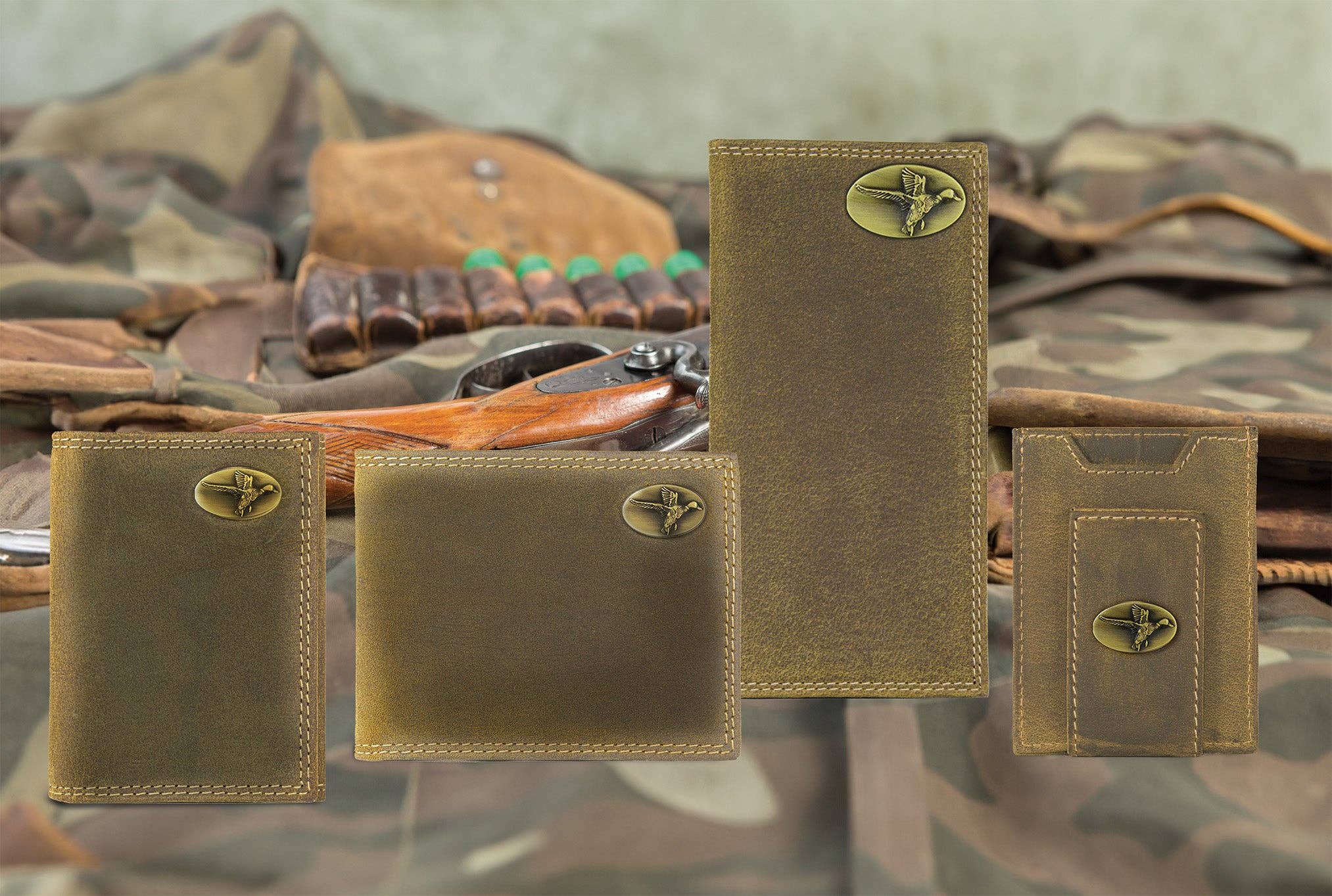 Set of brown leather wallets with gold accents on a camouflage background