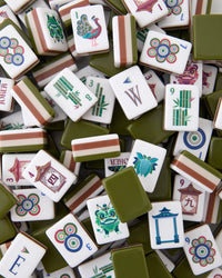 Collection of colorful Mahjong tiles with various designs.