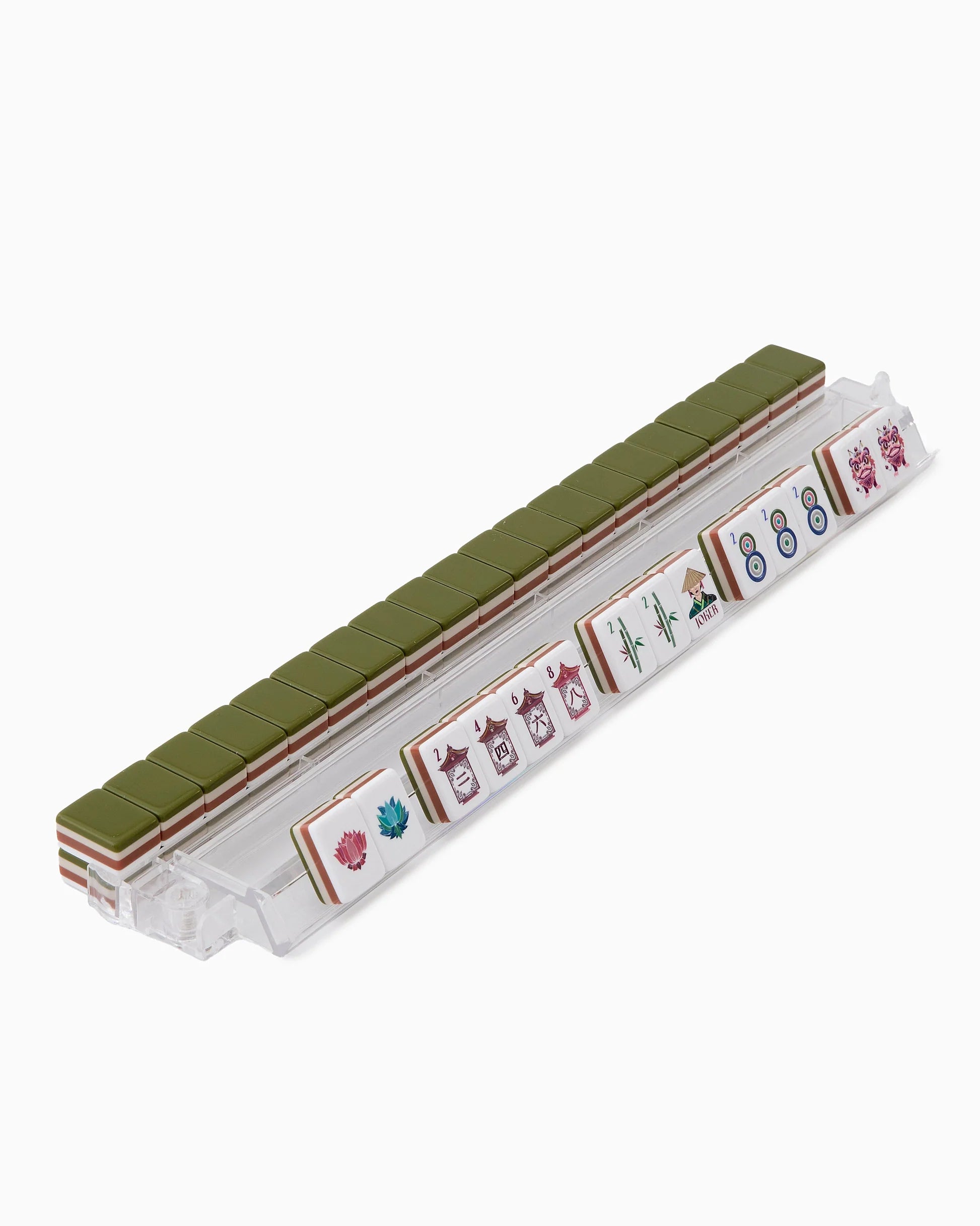 Set of Mahjong tiles in a clear plastic case on a white background
