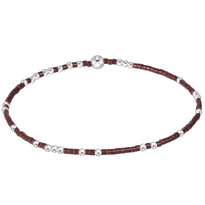 Bracelet with brown and silver beads on a white background