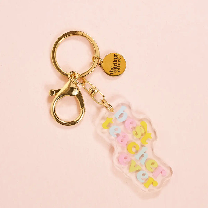 Keychain with colorful letters on a pink background