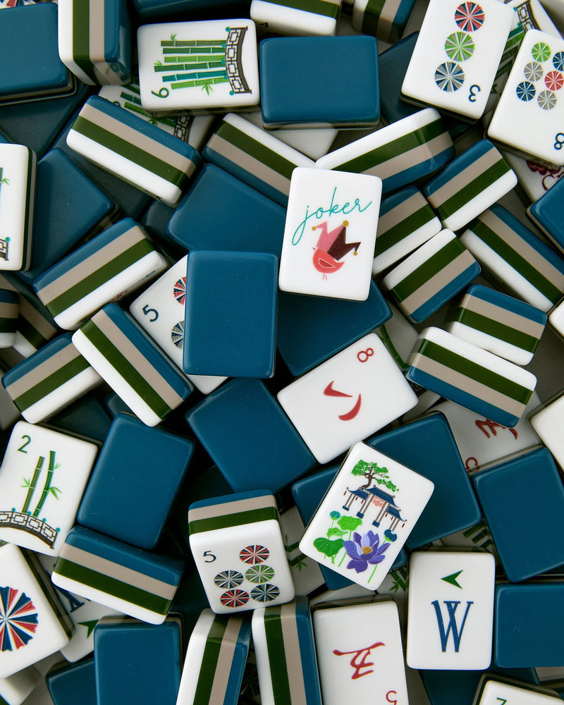 Collection of colorful Mahjong tiles with various symbols and a 'joker' tile.