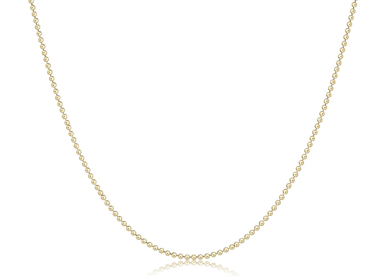 Gold necklace on a white background

