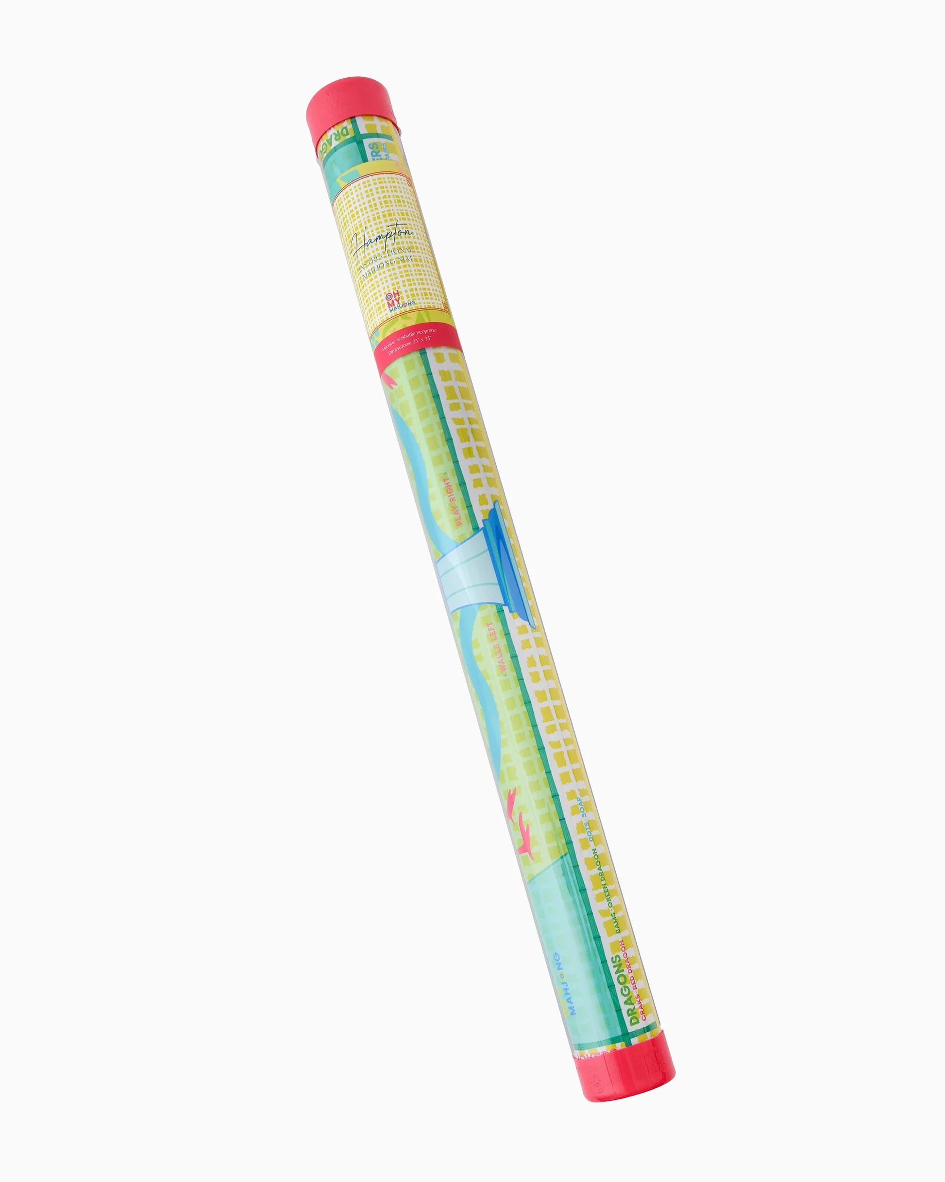 Colorful mahjong mat with bird and pagoda design rolled in a tube on a white background.