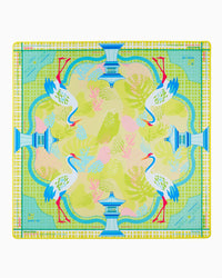 Colorful mahjong mat with bird and pagoda design on a white background