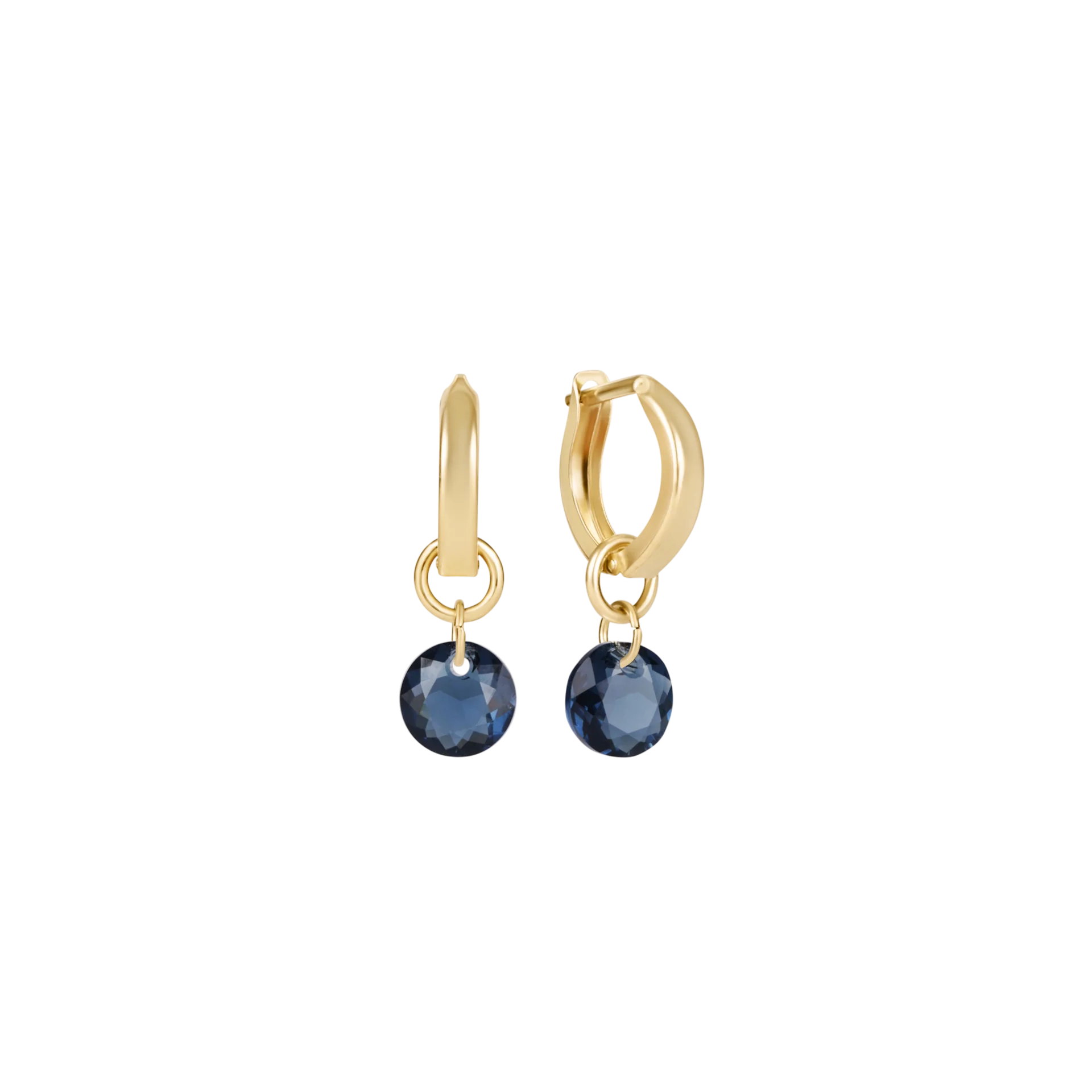 Gold hoop earrings with blue gemstones on a white background