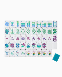 Set of colorful Mahjong tiles with a blue tile on a white background