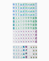 Sheet of Mahjong Tiles with various designs on a white background