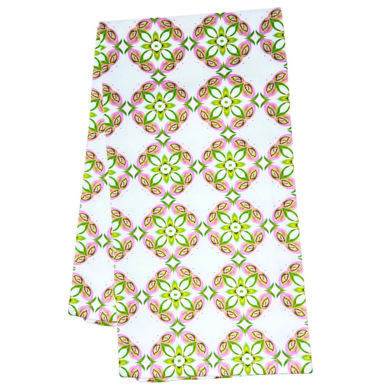Folded fabric with a colorful geometric pattern on a white background