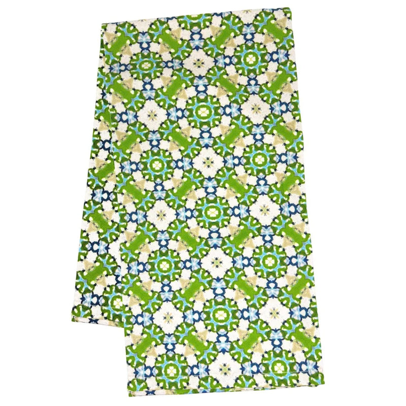 Folded fabric with a colorful geometric pattern on a white background