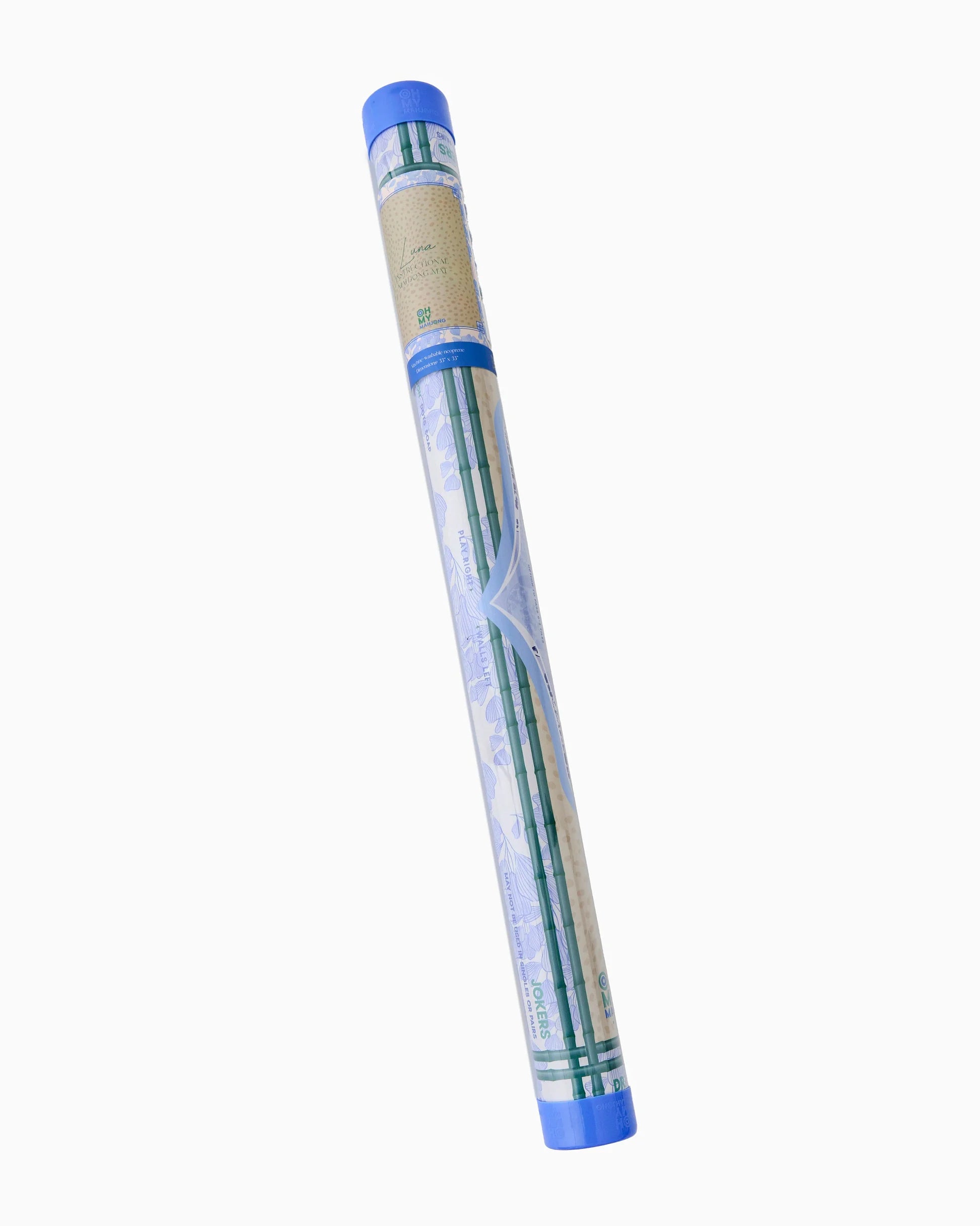 Mahjong Mat rolled in clear tube with blue and white design on a white background