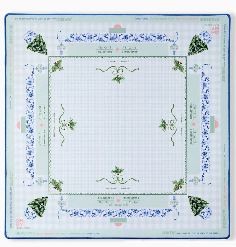 Decorative mahjong mat with floral patterns on a white background