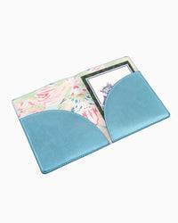 Blue metallic Mahjong card holder on a white background