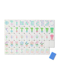 Set of decorative tiles with various designs on a white background