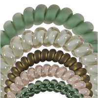 A close-up studio shot of multiple translucent beaded bracelets arranged in overlapping arcs. The beads are smooth, rounded, and come in pale mint green, creamy off-white, smoky brown, blush pink, and dark green tones.