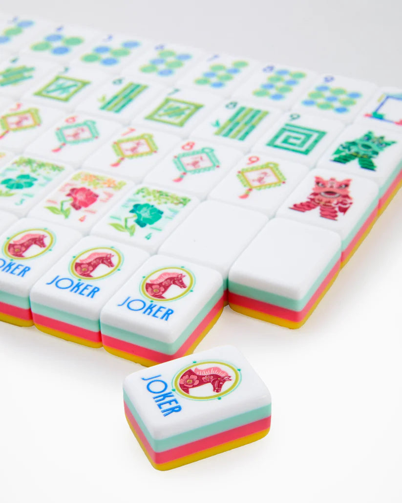 Colorful game pieces with 'Joker' text on a white background