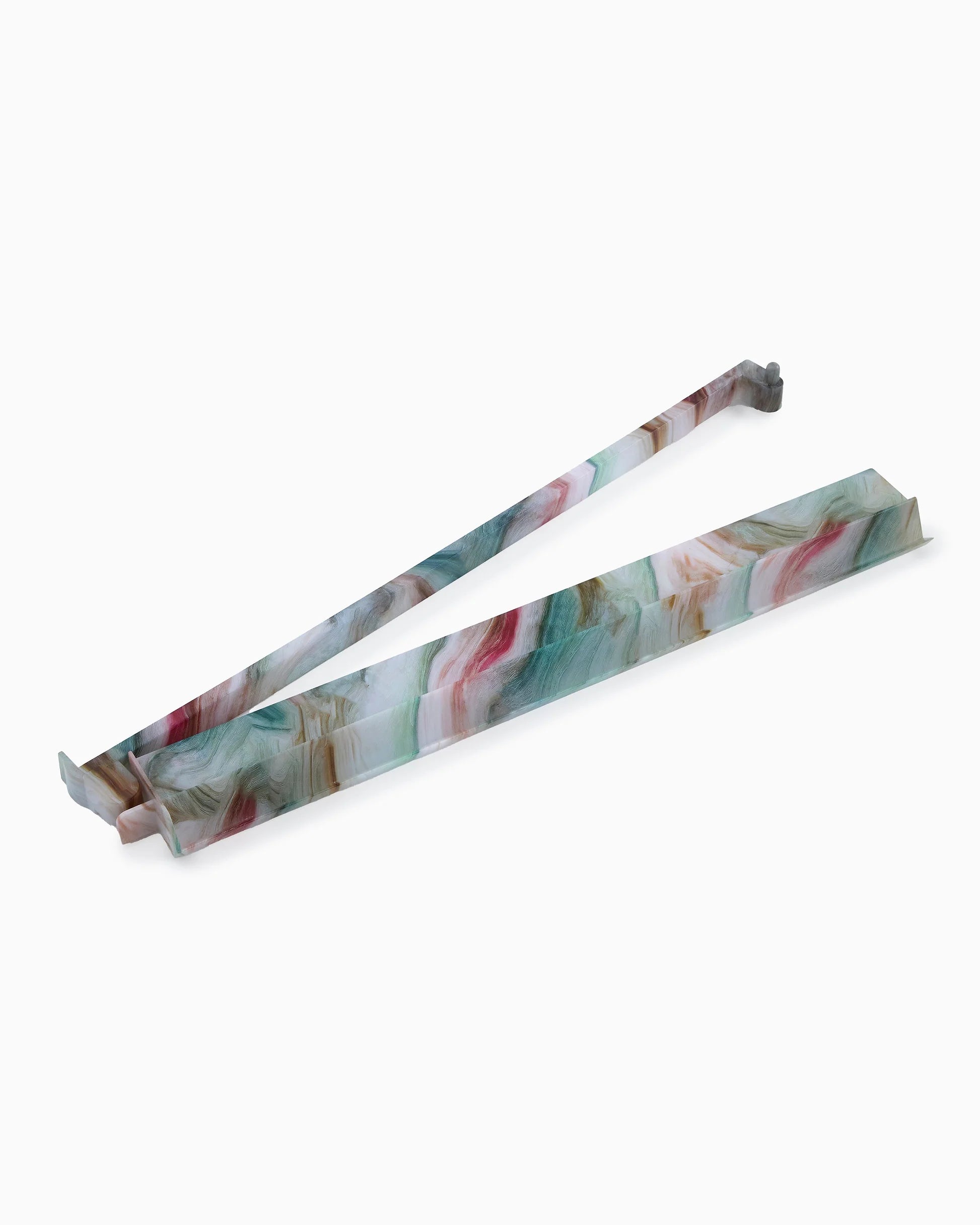 Marble-patterned mahjong racks on a white background
