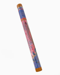 Colorful Mahjong Mat rolled in a clear tube with a pattern on a white background