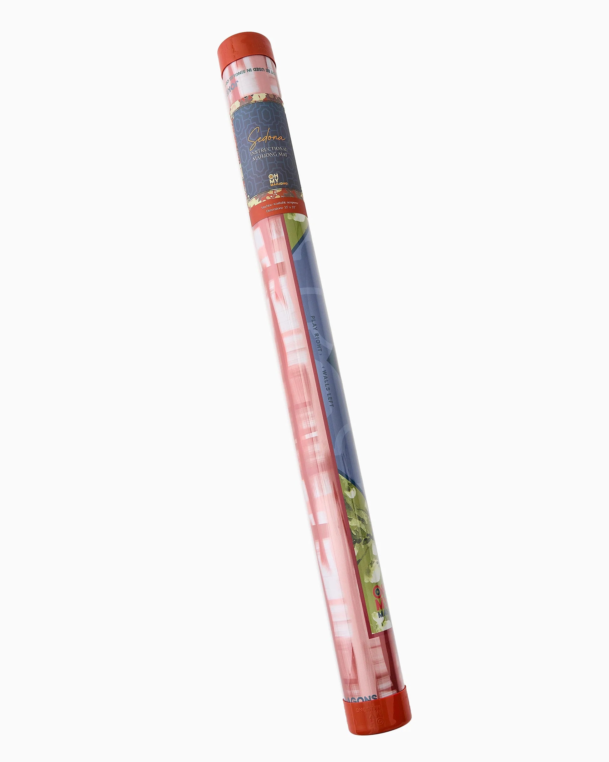 Long cylindrical Mahjong Mat rolled in a clear tube with colorful packaging on a white background