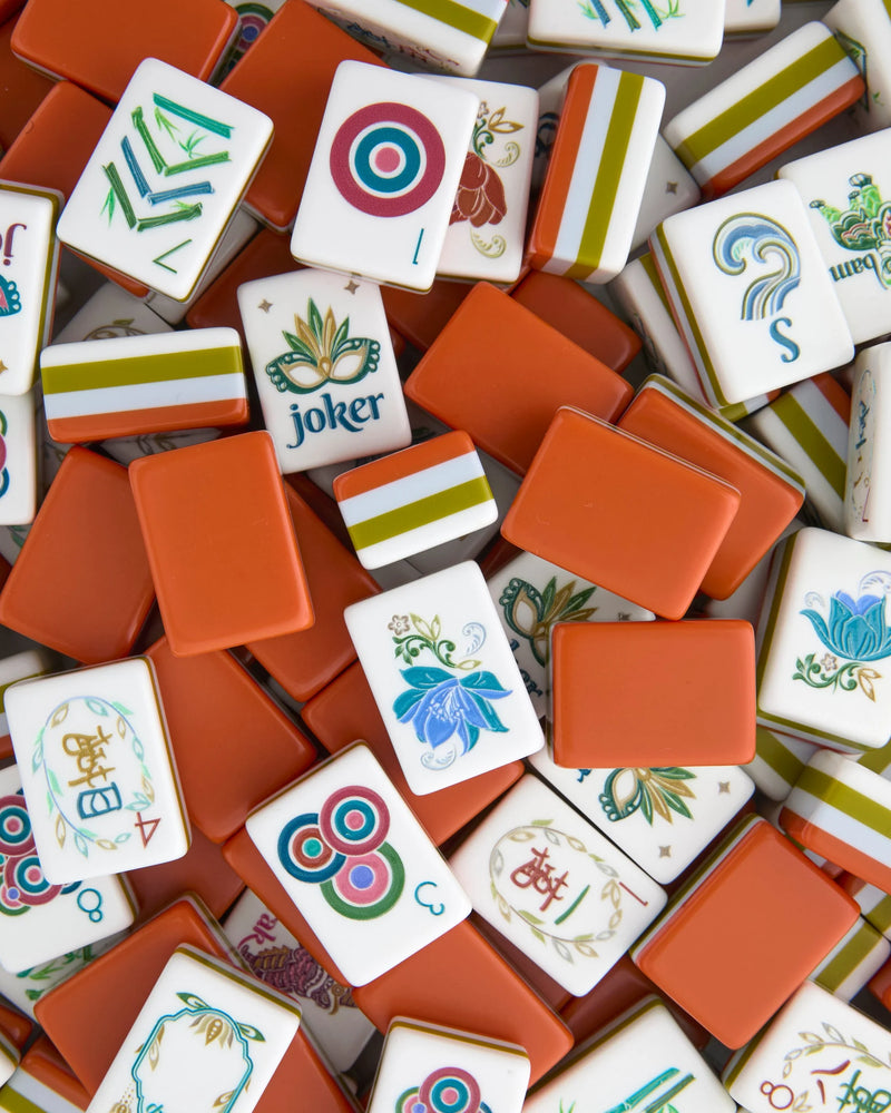 Collection of colorful  Mahjong game tiles with various designs and symbols.
