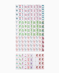 Collection of colorful patterned tiles on a white background