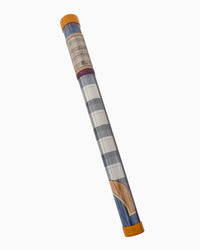 Decorative cylindrical object with plaid pattern on a white background
