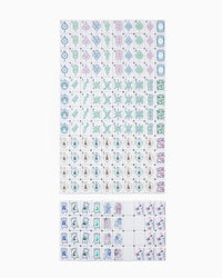 Set of colorful stickers with various designs on a white background