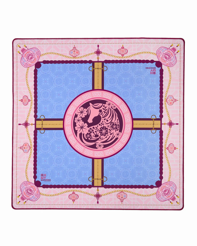 Decorative Mahjong mat with a central design of a horse and floral elements on a pink and blue background.